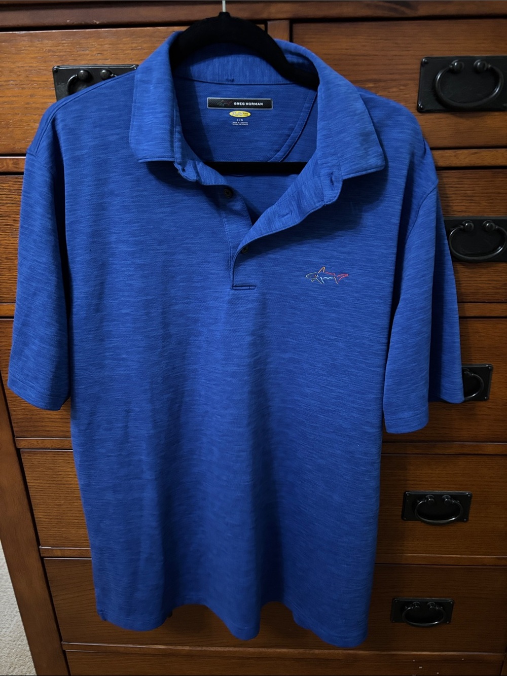 Greg Norman Collection Royal Blue Polo with Shark Emblem